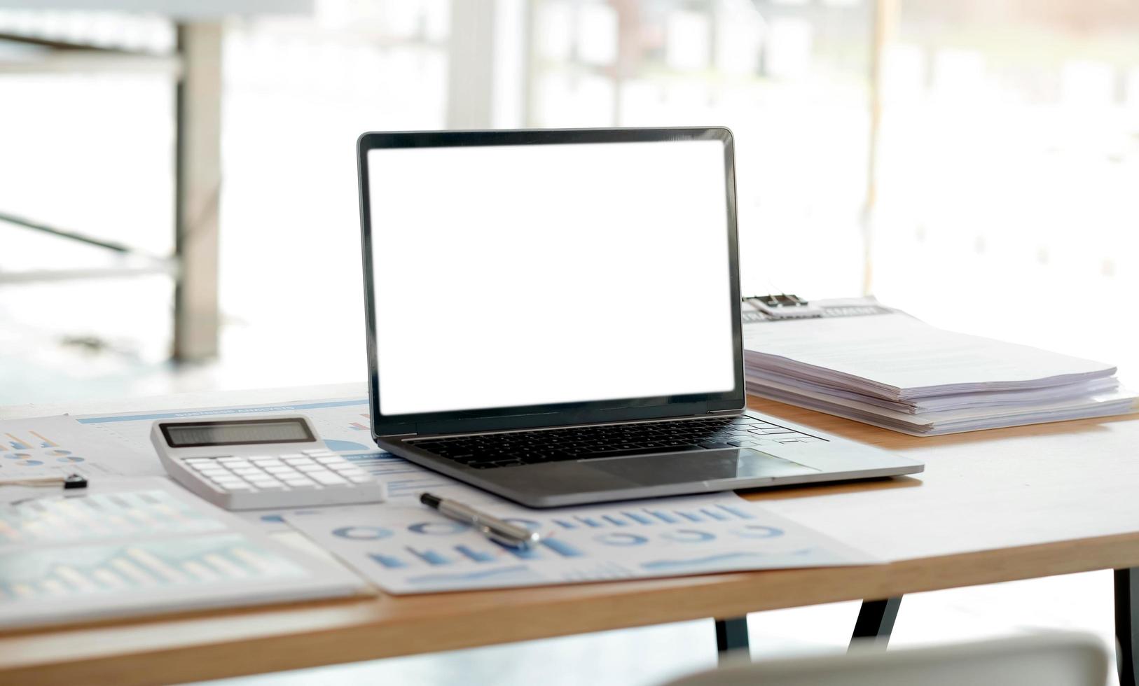 Laptop or notebook with blank screen on the floor service counter in the office. photo