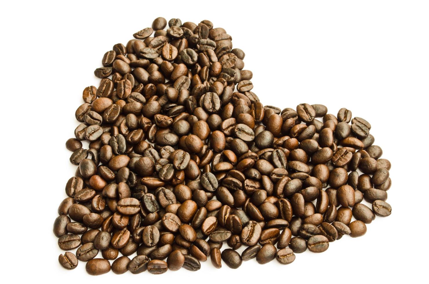 Coffee beans heart on white background photo