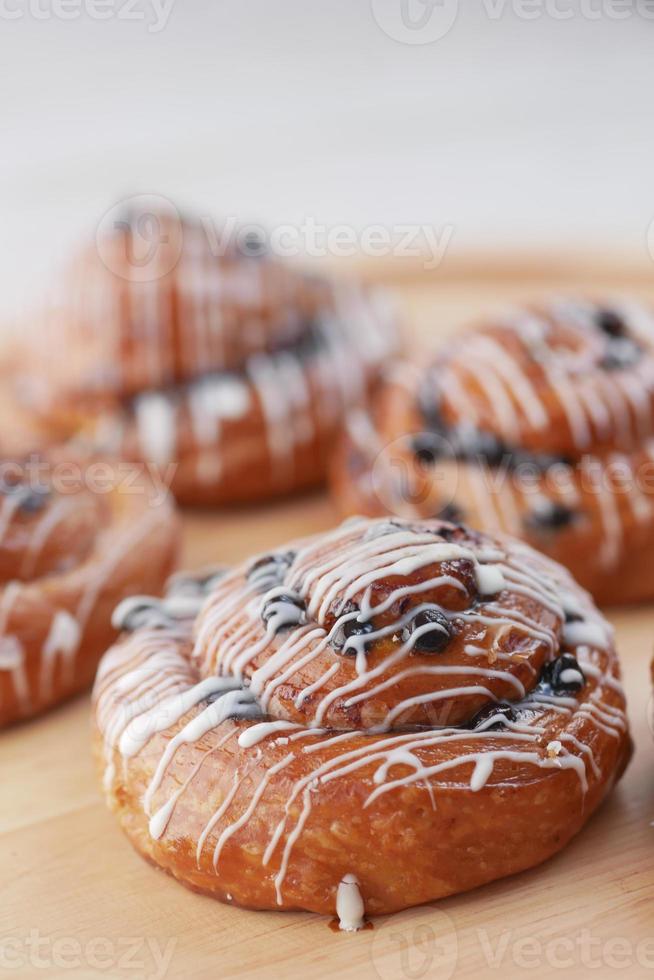 close up cinnamon danish roll on table photo