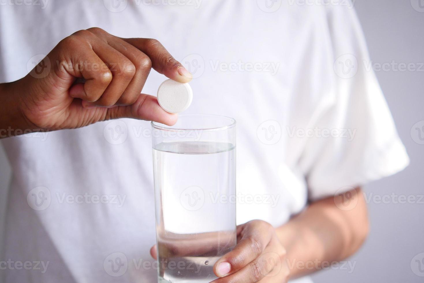 holding a Effervescent soluble tablet pills photo