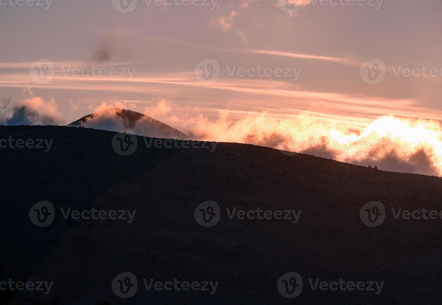 Petros Mountain in the morning fog, overcast mountain range at dawn, the magical mountains of Ukraine. photo