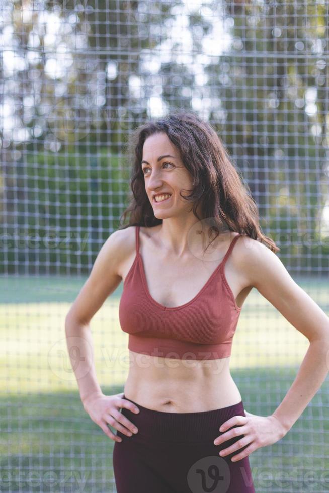 Portrait of a smiling sportive woman photo