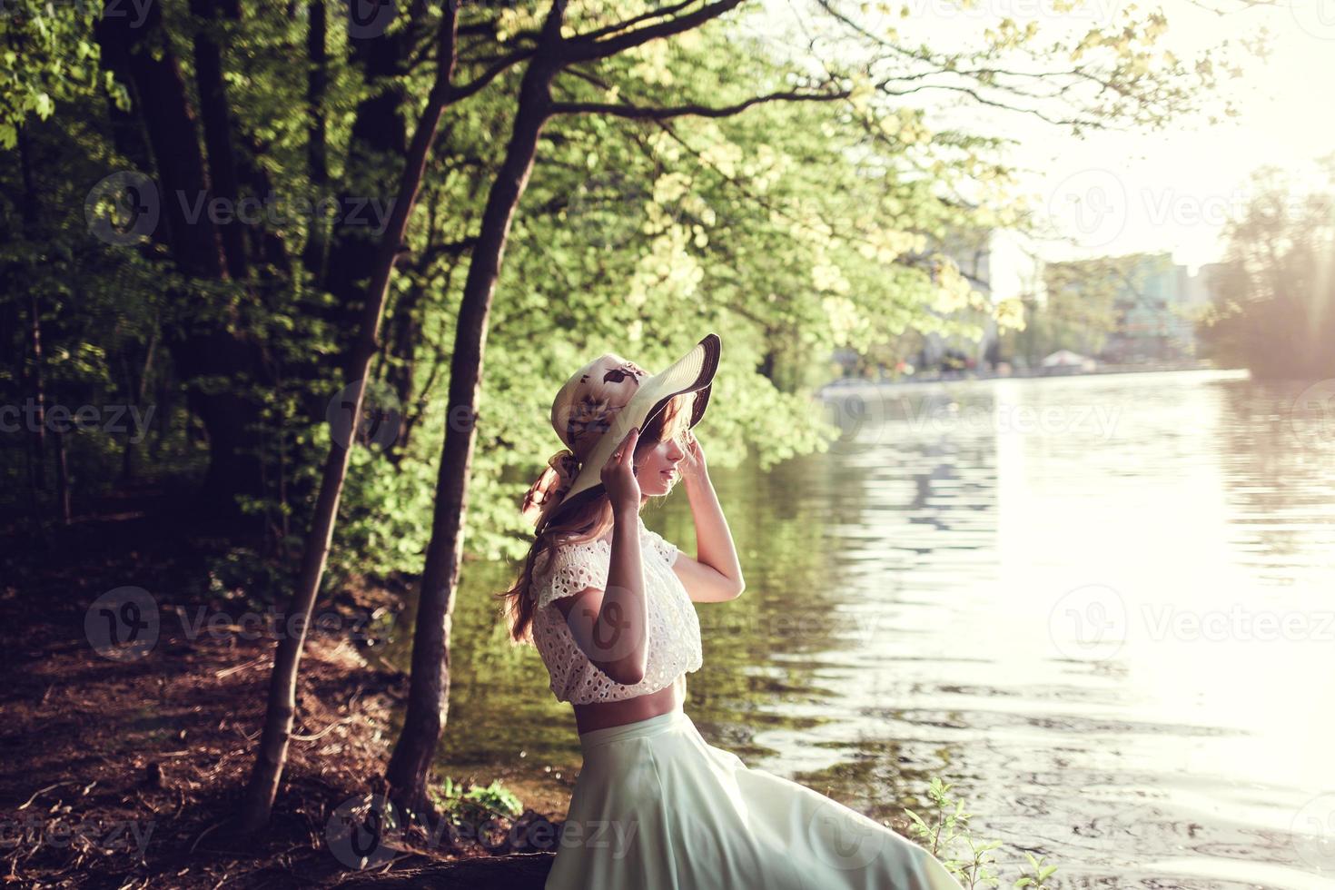 Romantic outdoors shots of stylish brunette photo