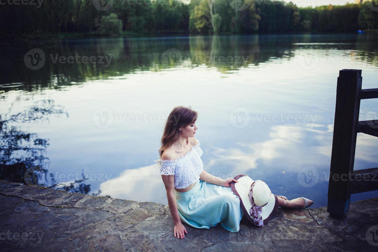 Perfect woman outdoors in park photo