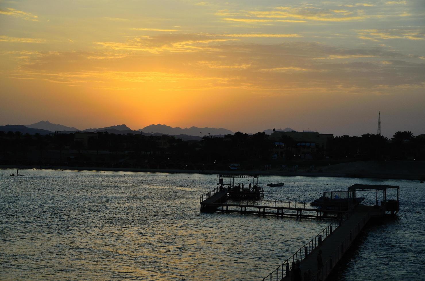 jetty at sea after sunset photo