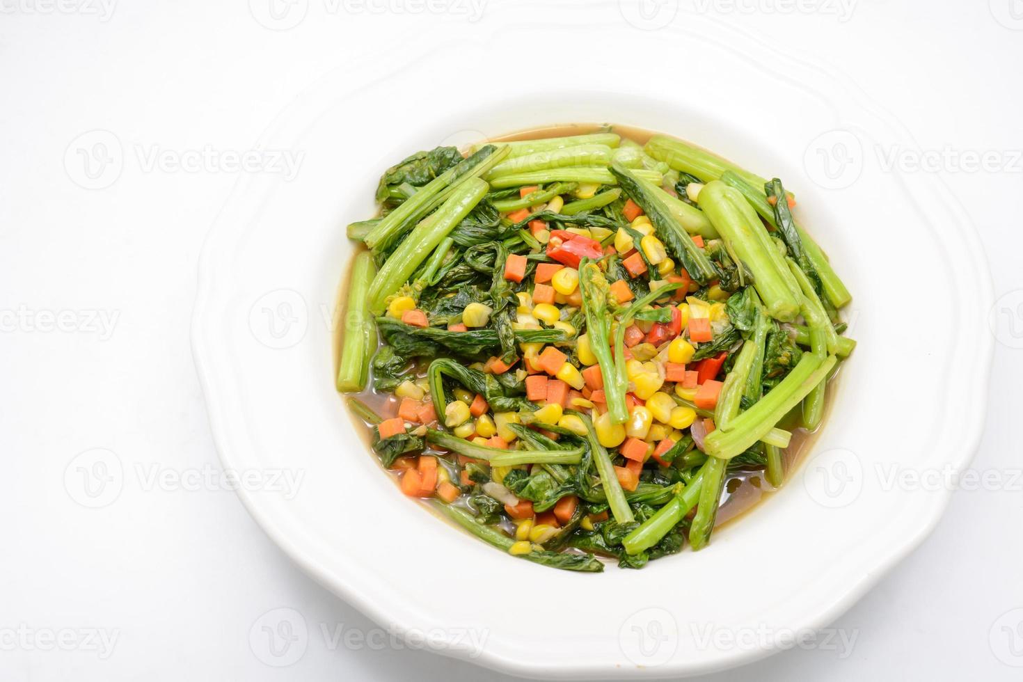 Stir fried Chinese kale with oyster sauce and pork photo