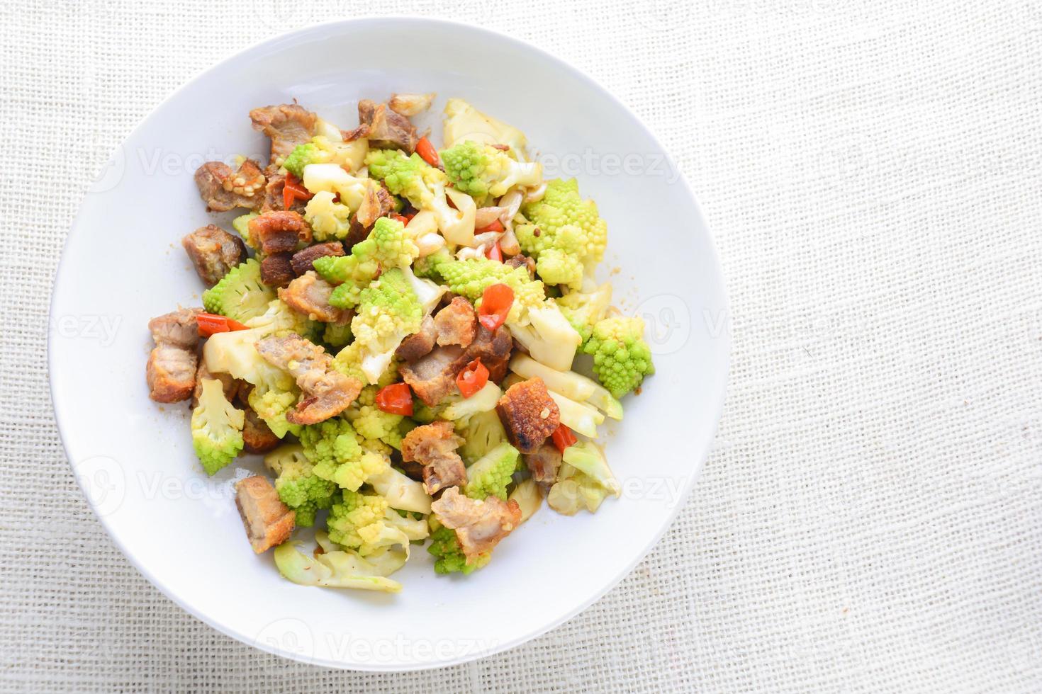 Stir fry Romanesco broccoli with crispy pork and chili, very healthy and delicious photo