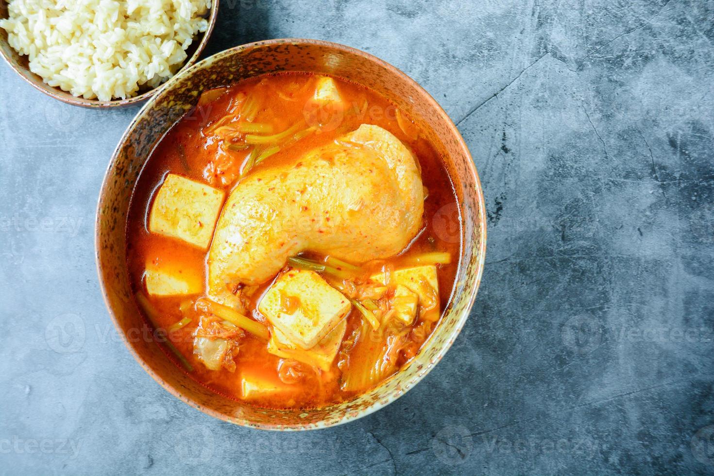 Korean traditional Kimchi soup with chicken and soft tofu 7143109 Stock