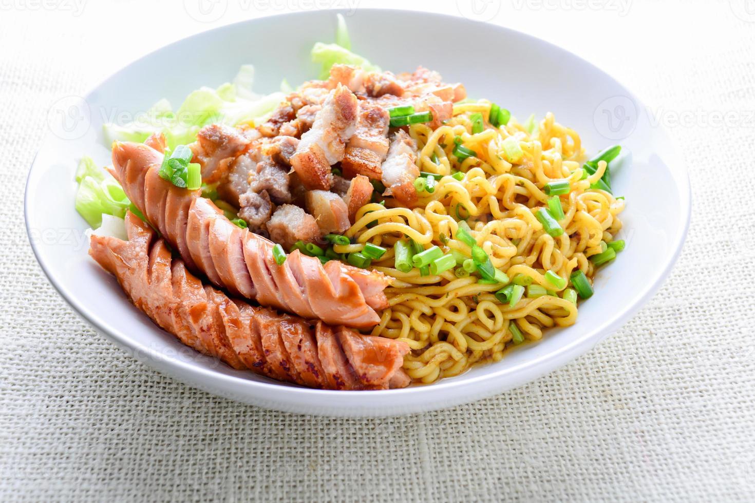 Udon noodles with grilled pork, sausage and cabbage - Japanese cuisine photo