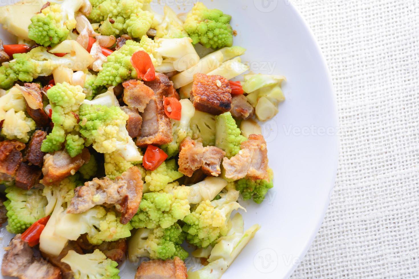 Stir fry Romanesco broccoli with crispy pork and chili, very healthy and delicious photo