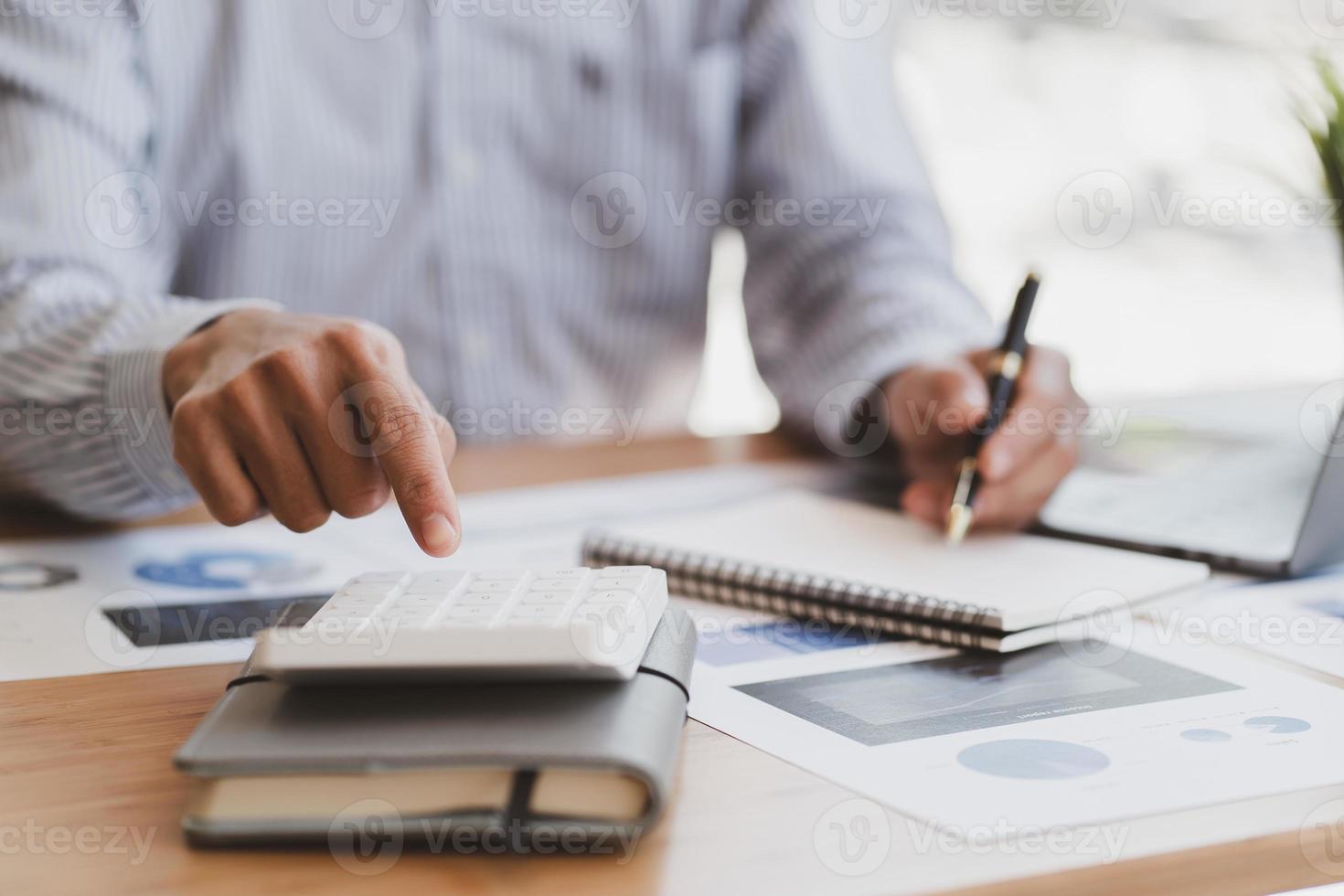 strategy analysis concept, Businessman working financial Manager Researching Process accounting calculate analyse market graph data stock information review on the table in office. photo