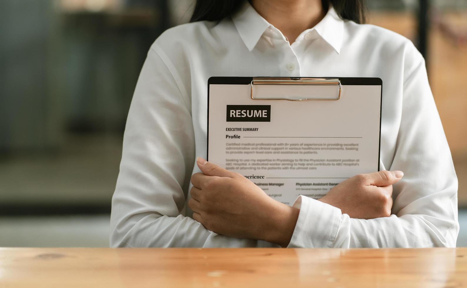 Business find new job, interview the job and hiring. Job applicant holding resume.Open handshake and resume job interview or acceptance. photo