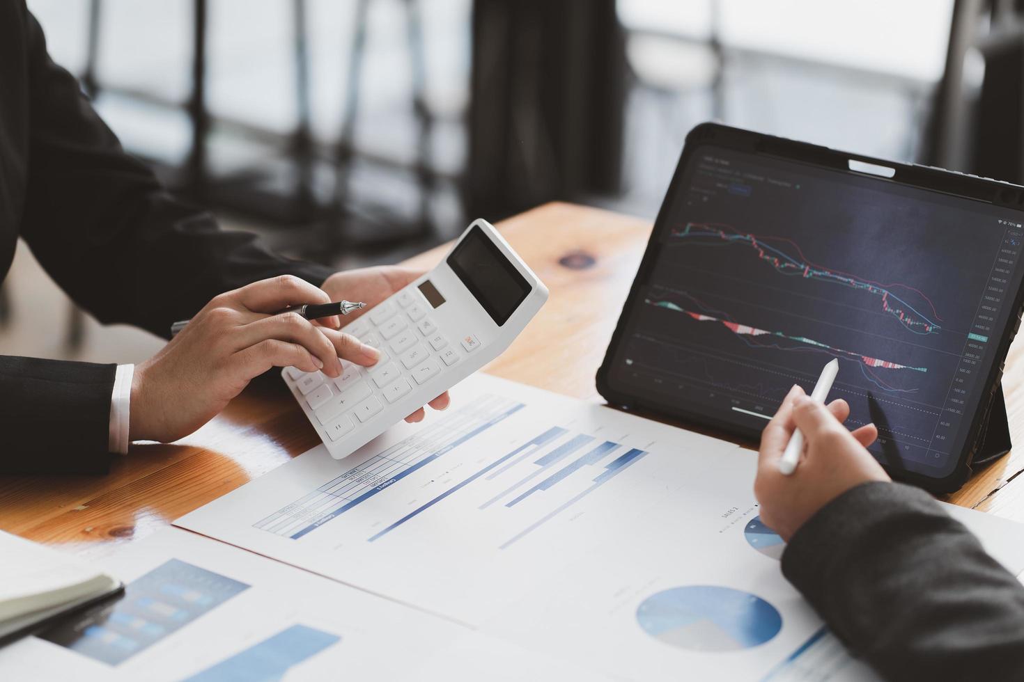 Businessman Investment Entrepreneur Trading discussion and analysis graph stock market trading,stock chart concept. photo