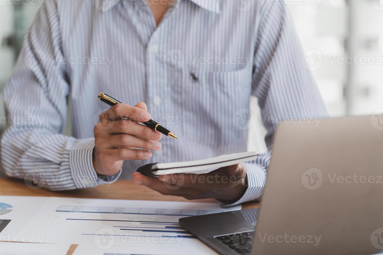 Businessman working with financial report, talking about business plan for investment, finance analysis concept. photo