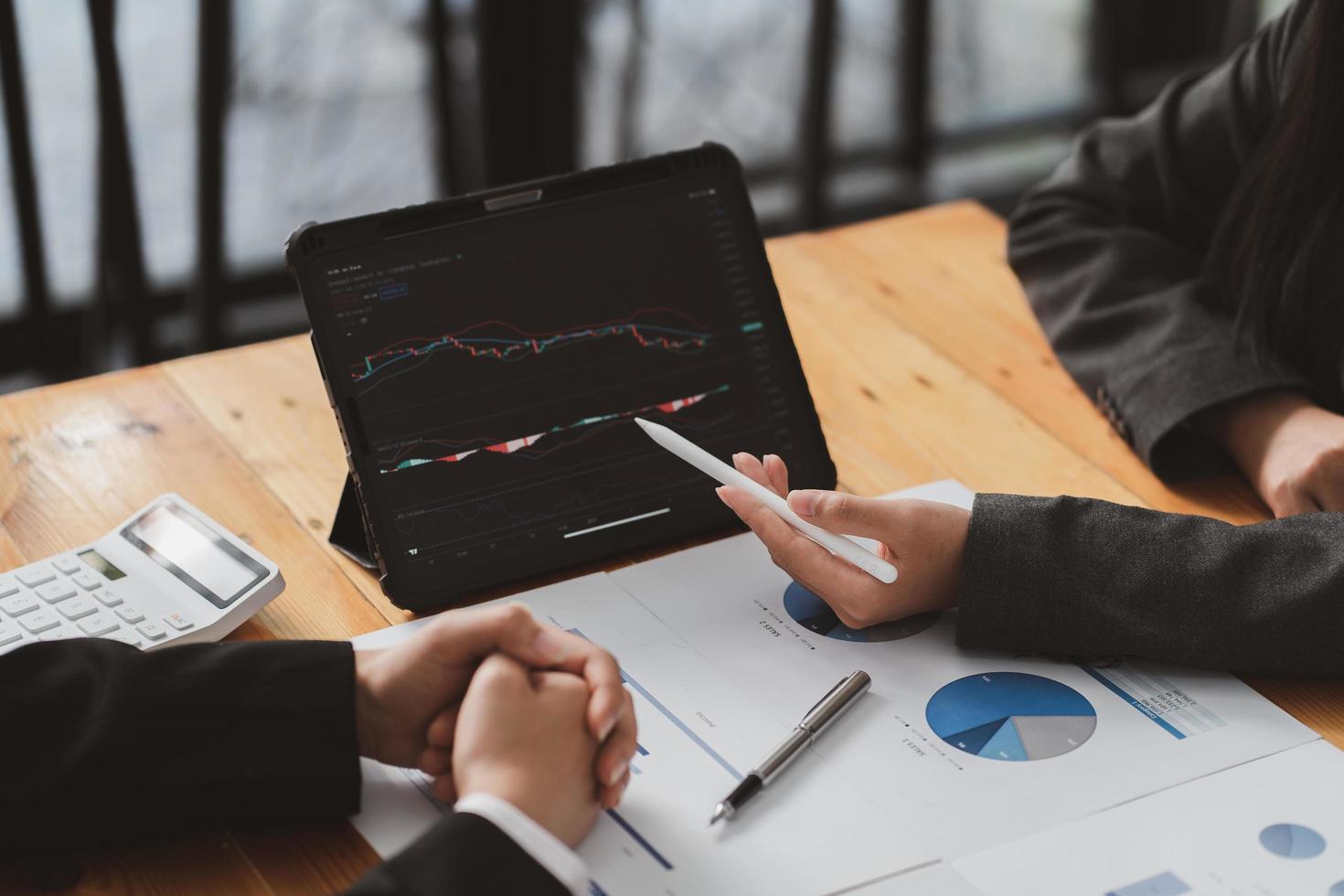Businessman Investment Entrepreneur Trading discussion and analysis graph stock market trading,stock chart concept. photo