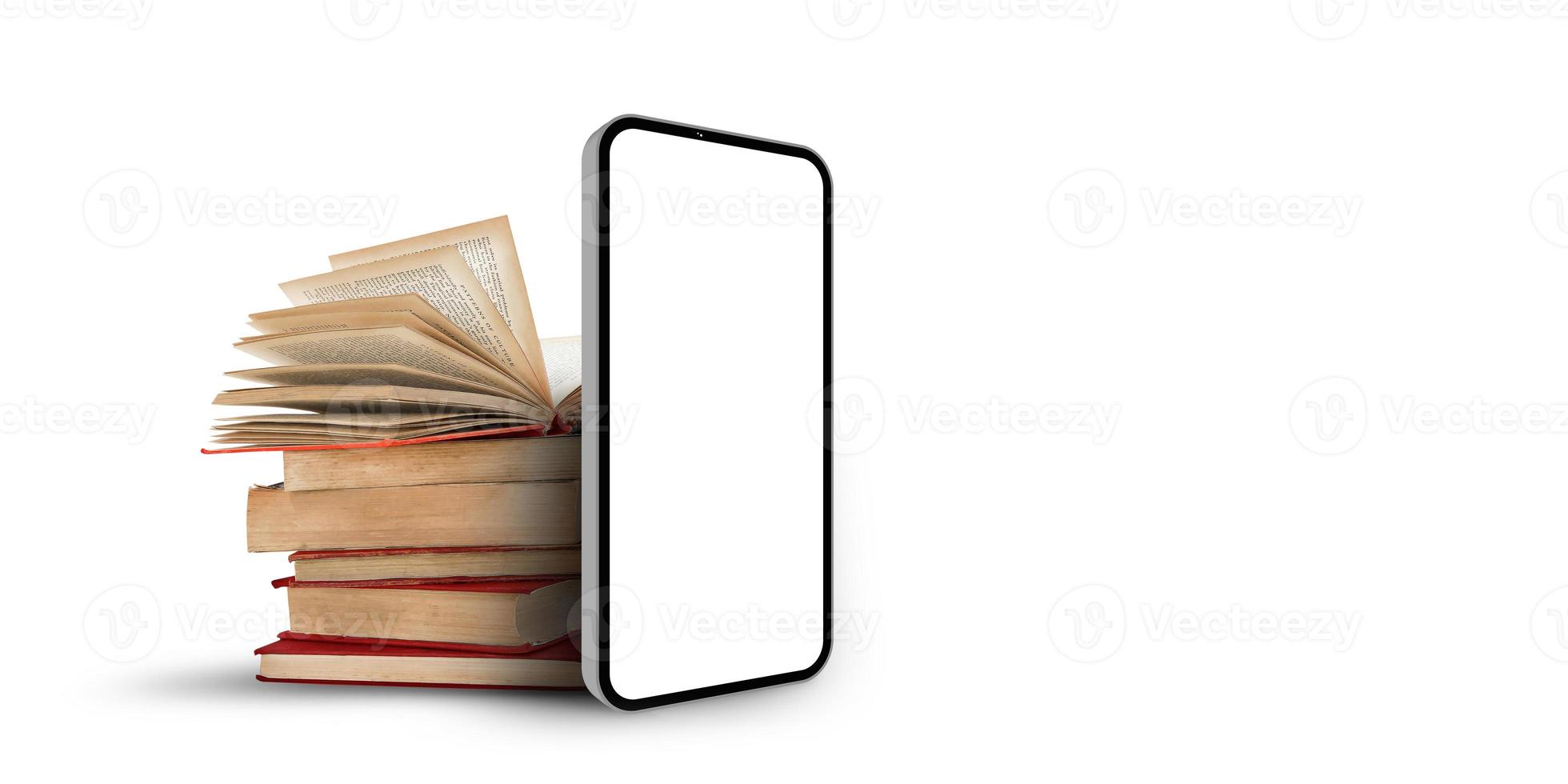 Old books and smartphone on white background. photo