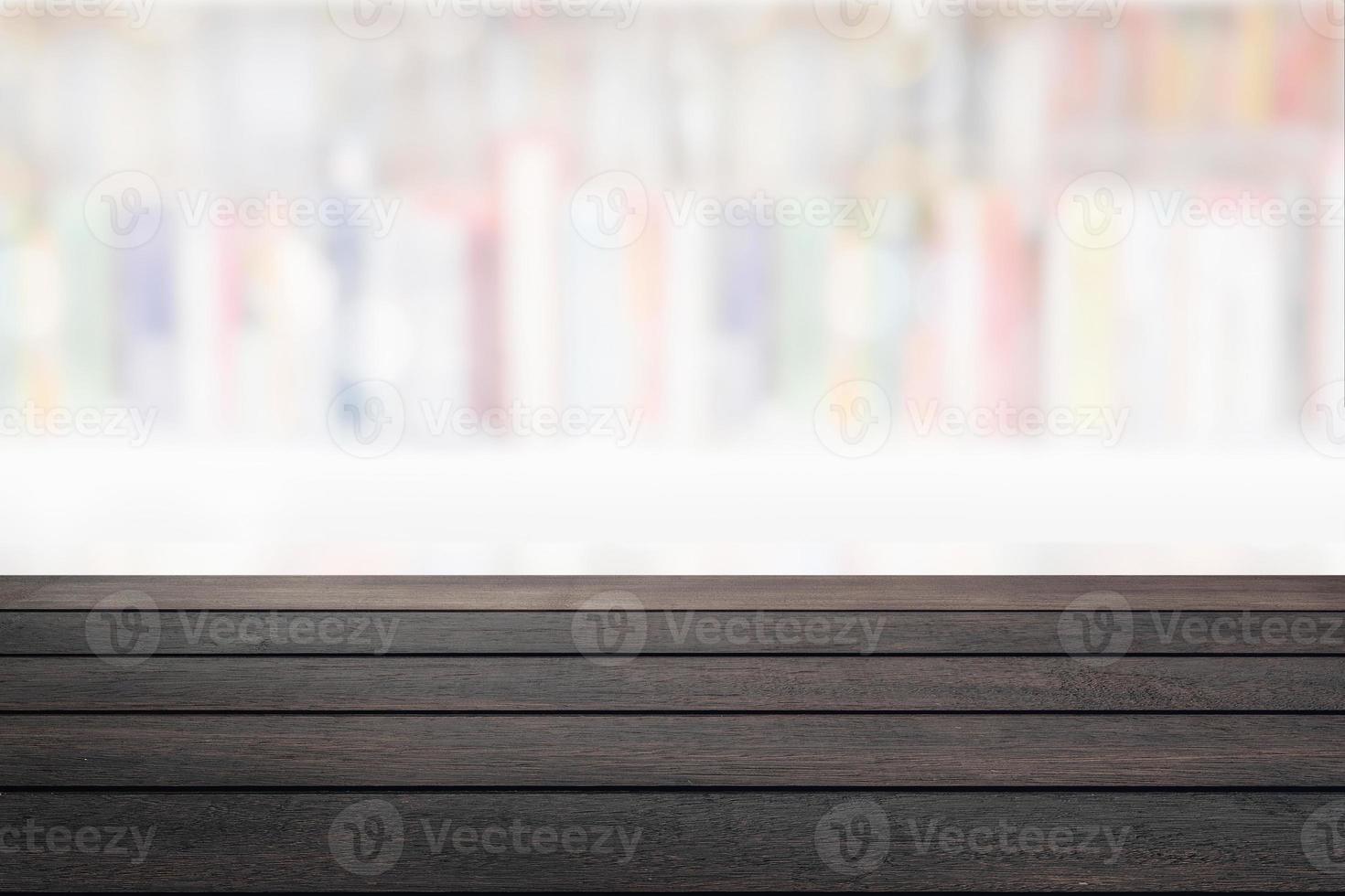 Empty wood table with abstract blur interior room background. photo