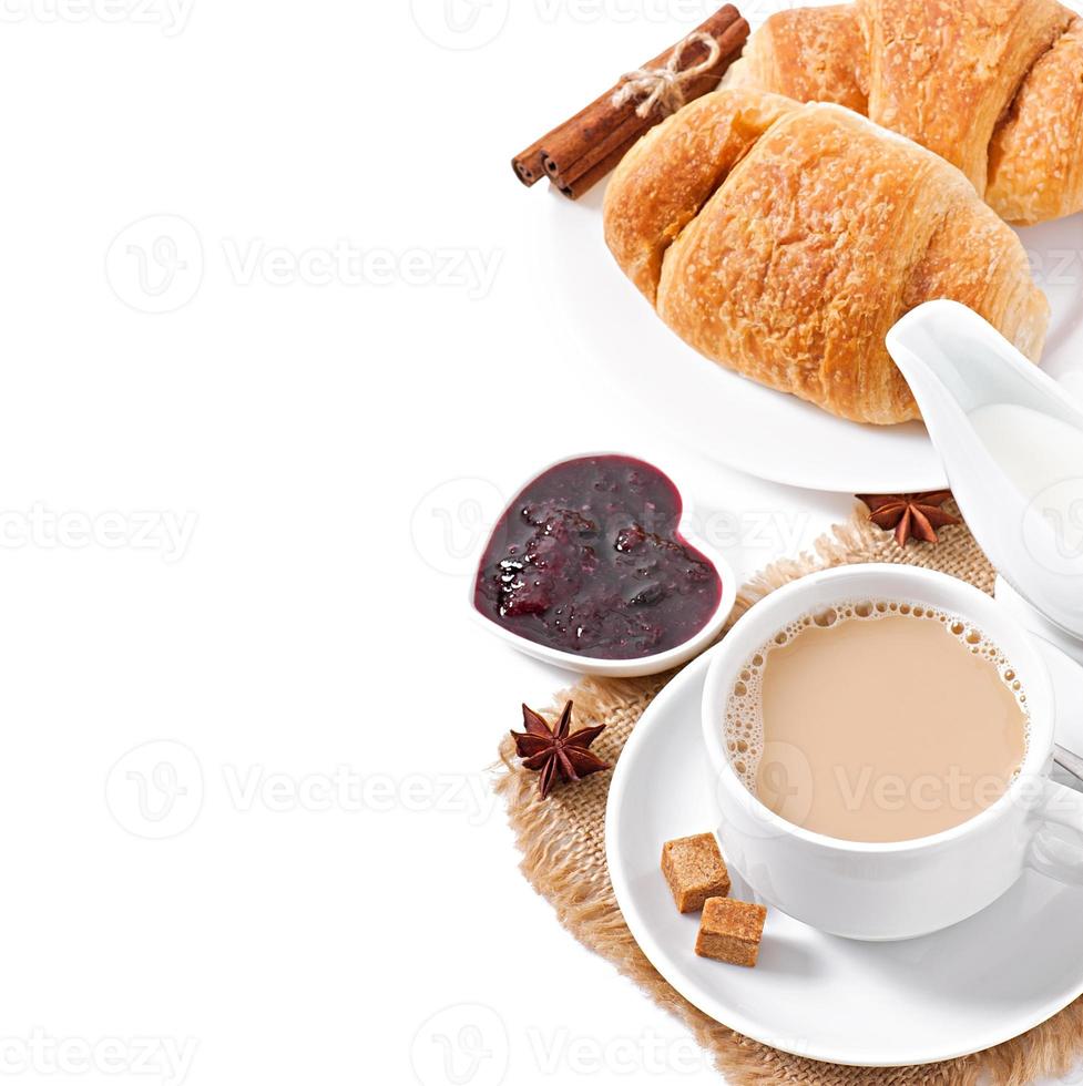 Breakfast with coffee and fresh croissants photo