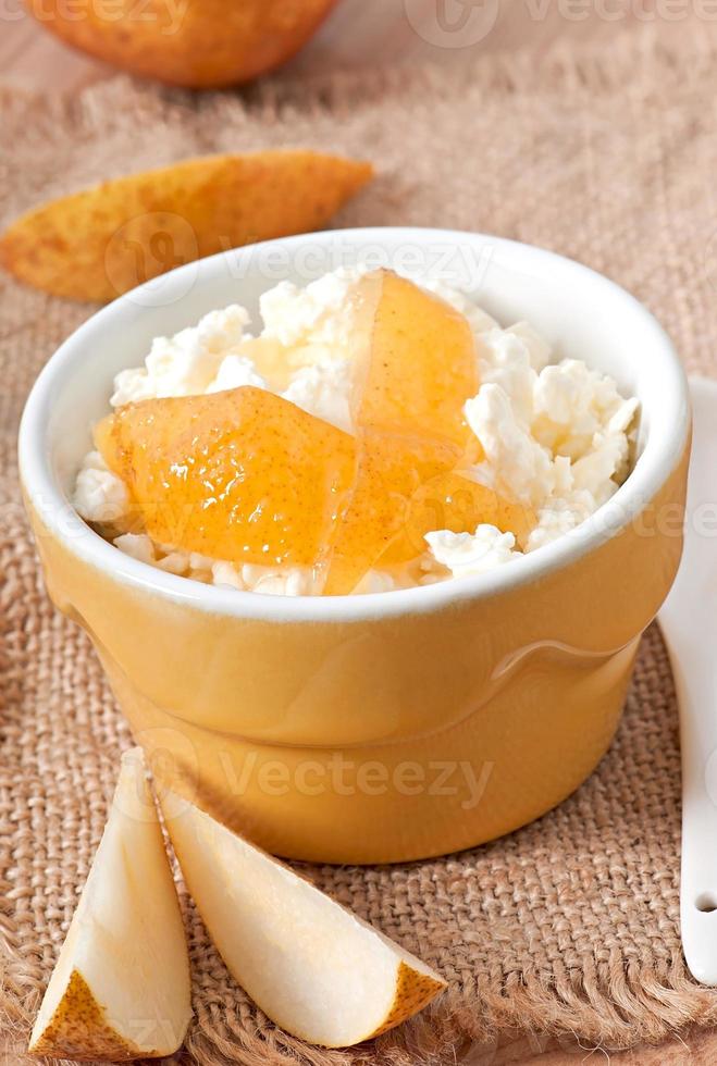 cottage cheese in bowl with pear jam photo