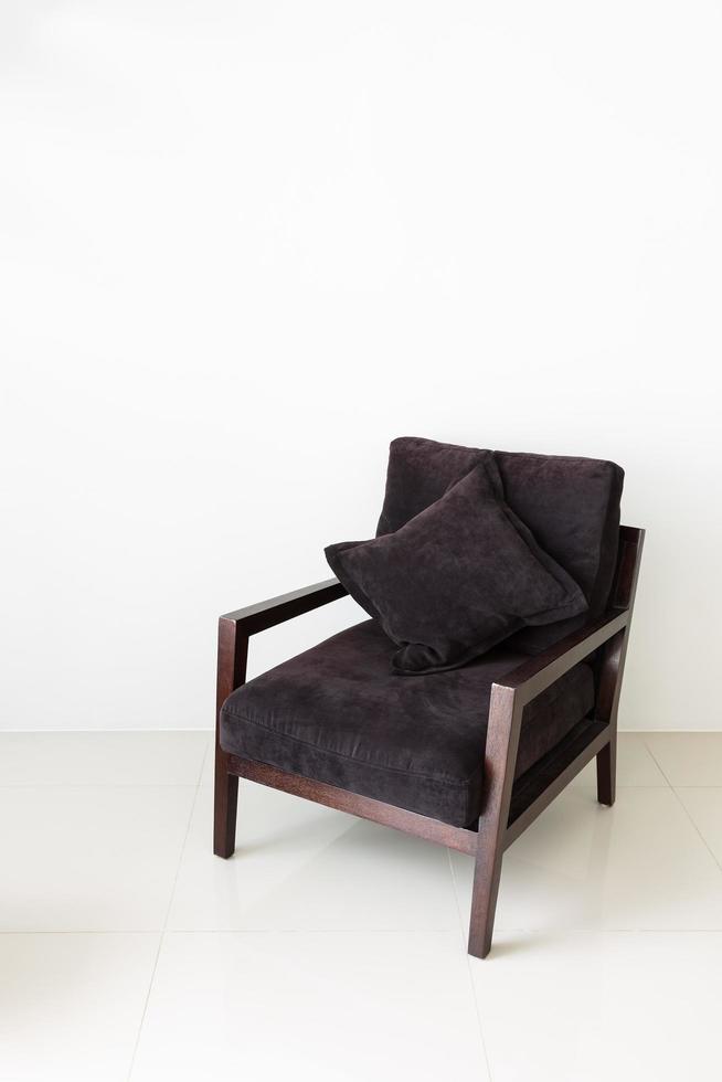 Brown chair with pillow photo