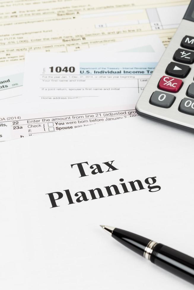 Tax planning wirh calculator taxation concept photo