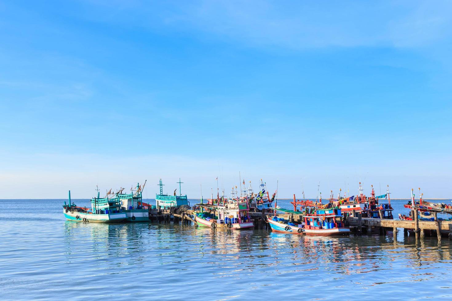 Fishing boats at pier, Chonburi Thailand photo