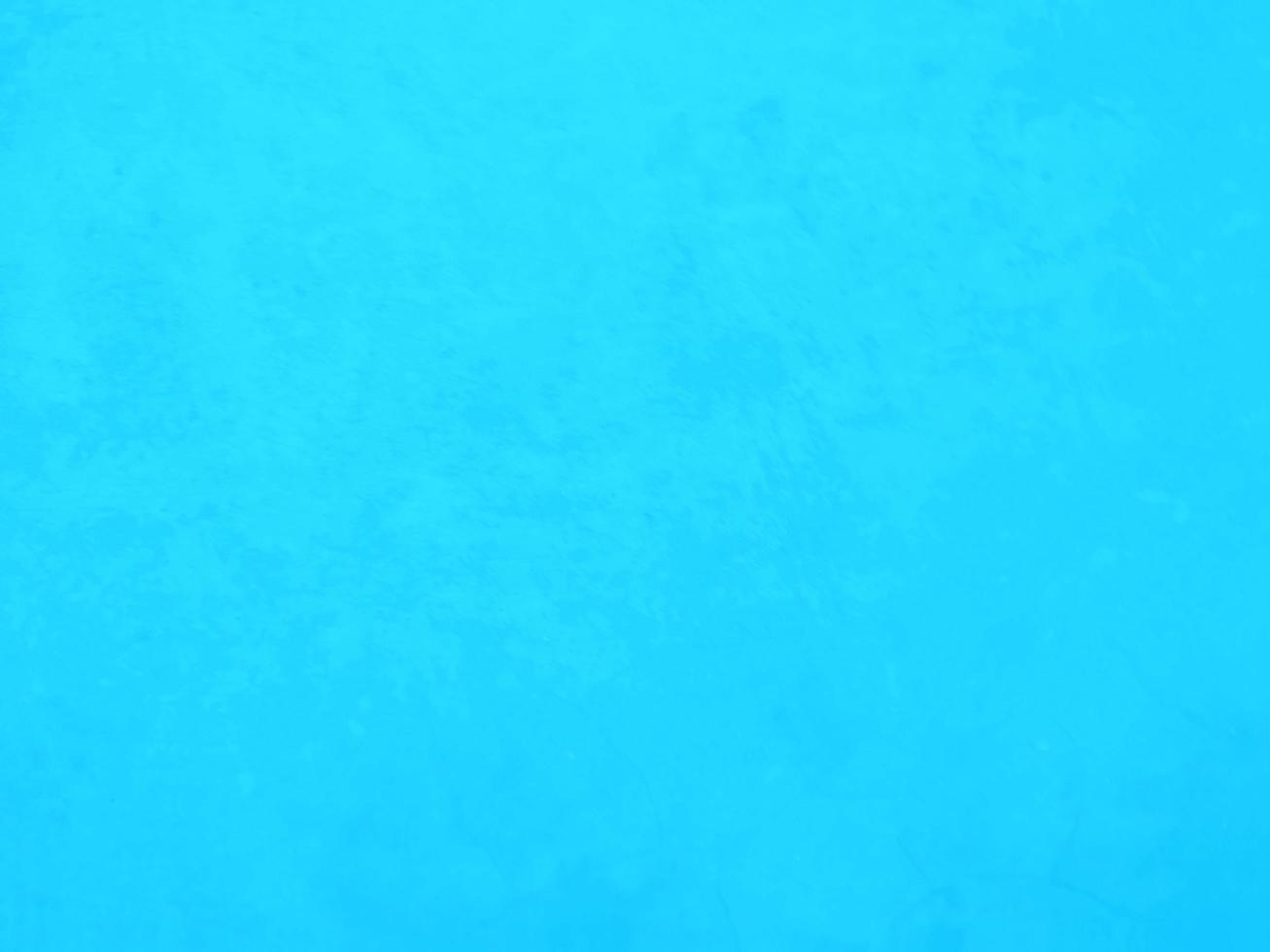 Paint blue color on the Cement wall has gray color and smooth abstract surface texture concrete material background photo