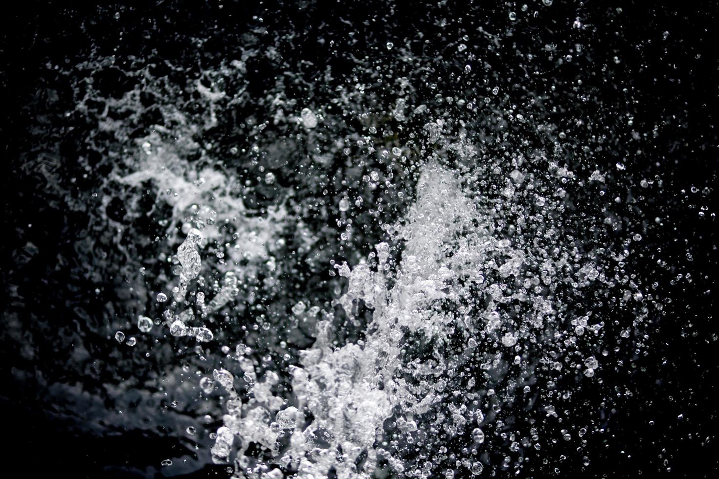 Water Splash on black background. photo