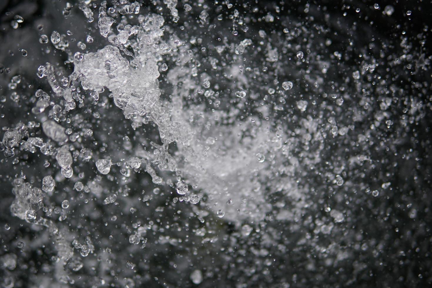 Water Splash on black background.Stylish water splash. Isolated on black background. photo