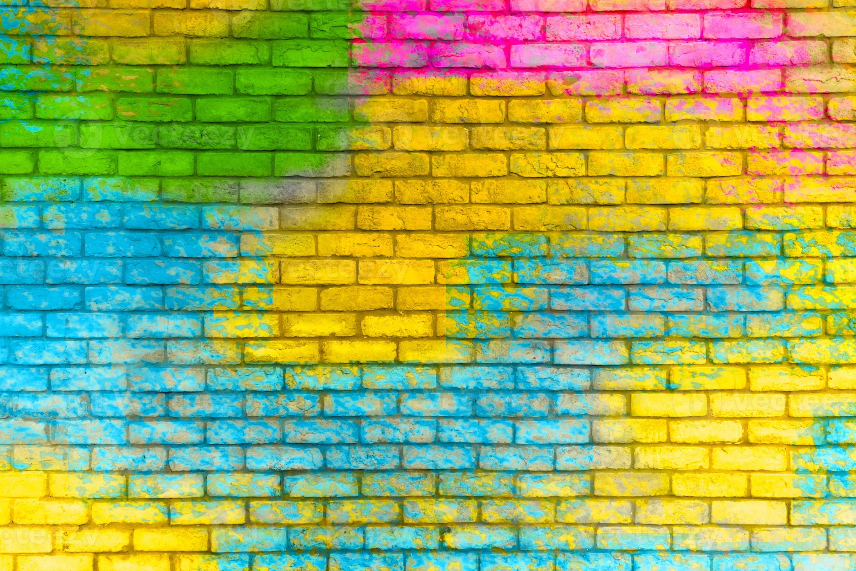 Colorful painted brick wall texture background. Graffiti brick wall