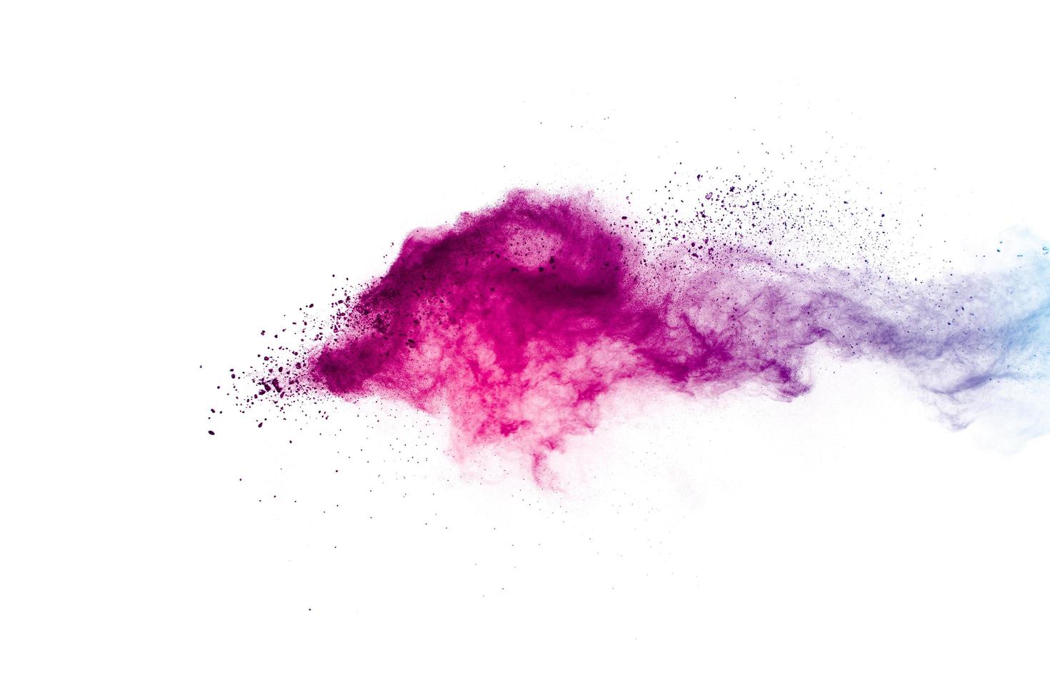 Purple blue color powder explosion cloud on white background. photo