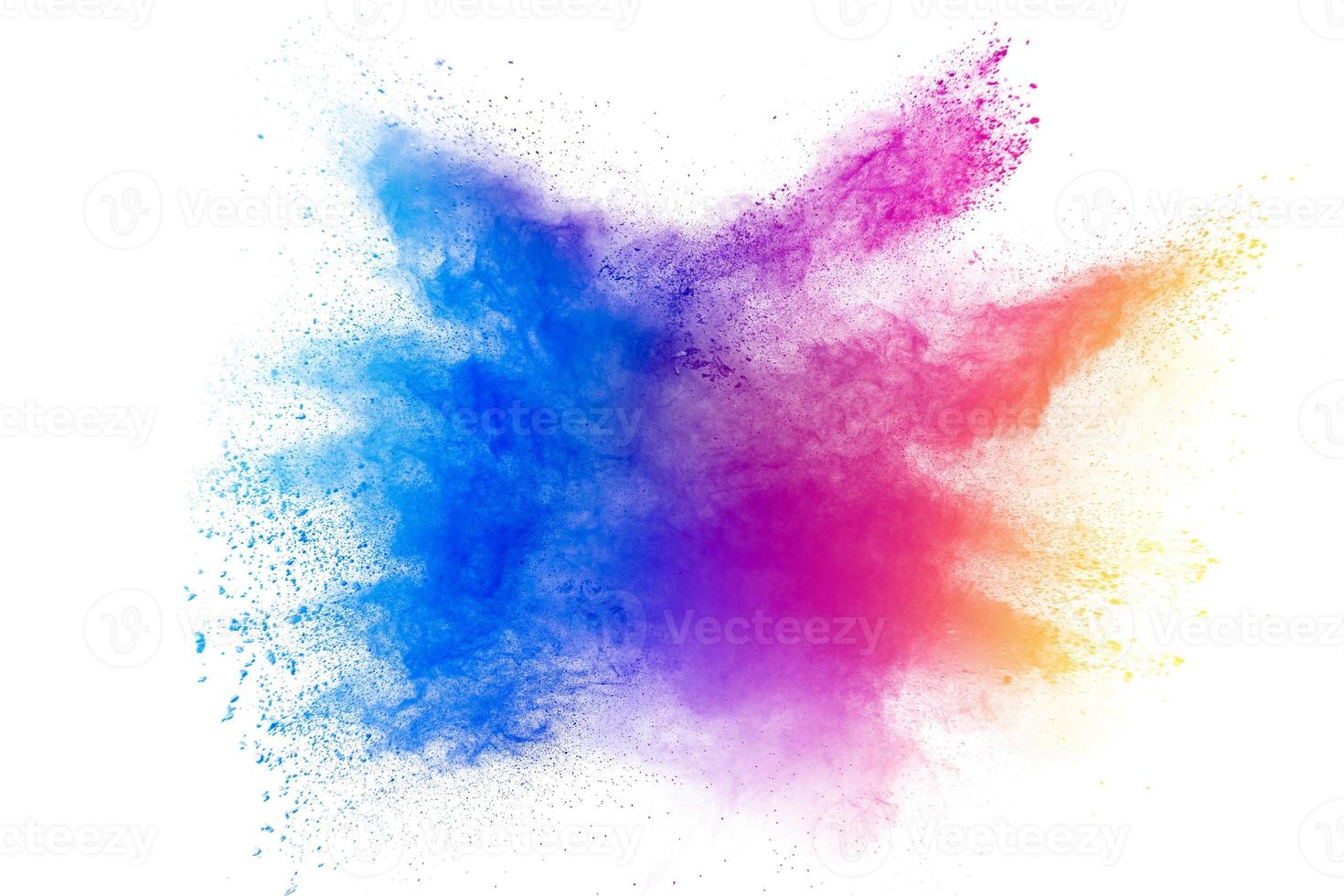 abstract multicolored powder splatted on white background,Freeze motion of color powder exploding photo