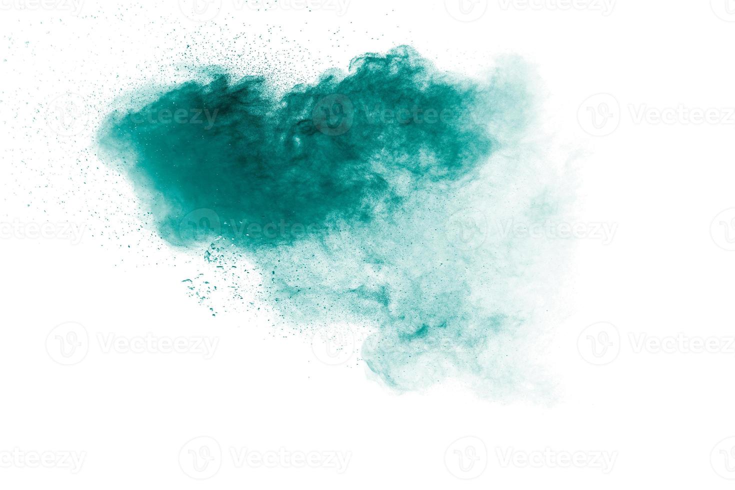 Green powder explosion on white background. photo