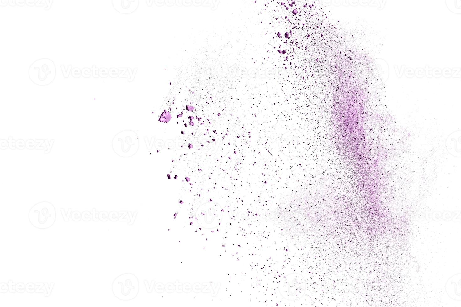 abstract multicolored powder splatted on white background,Freeze motion of color powder exploding photo