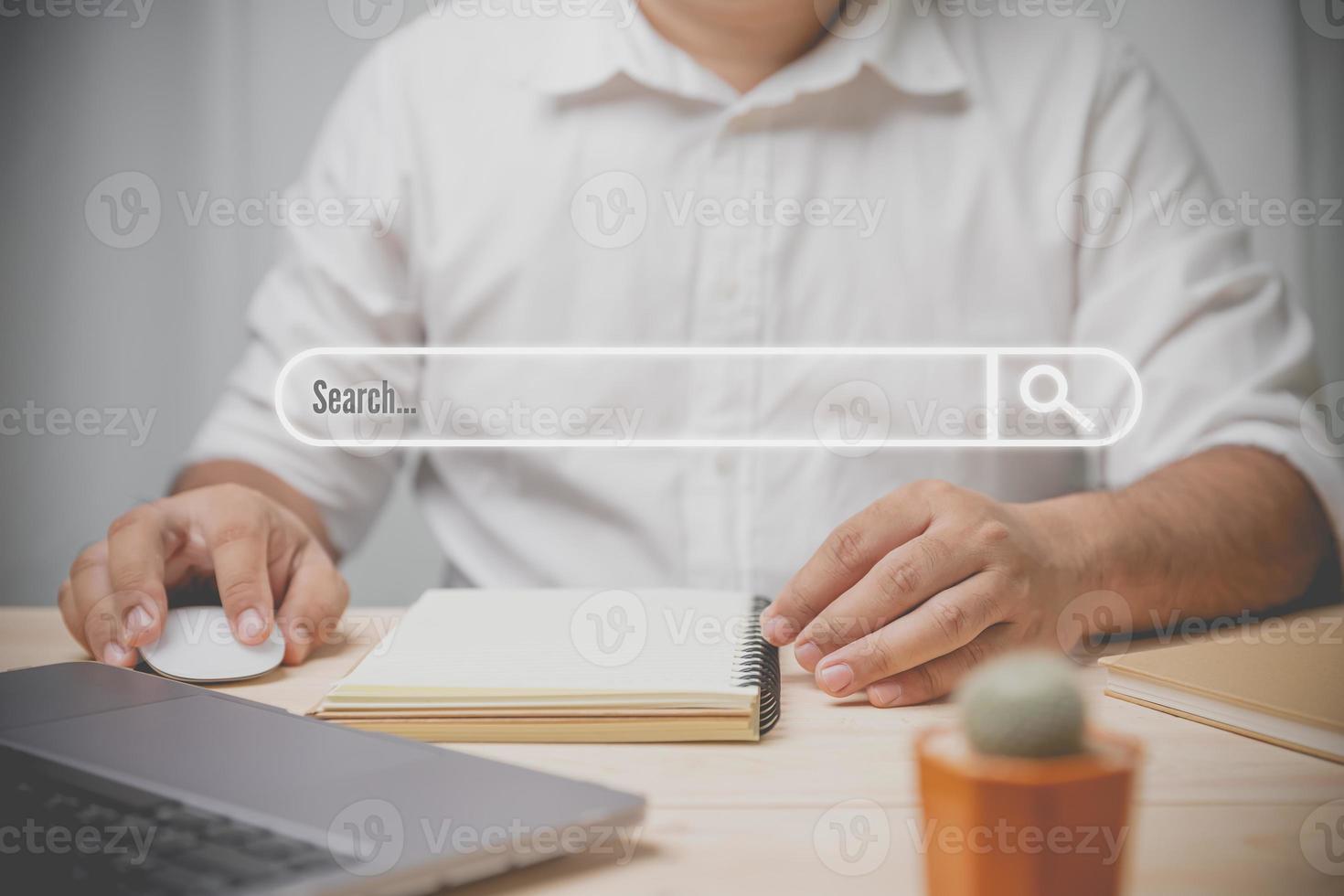 Internet online, technology, social network, business concept. Businessman using computer searching browsing data internet, technology search engine optimization with web pages on the background. photo