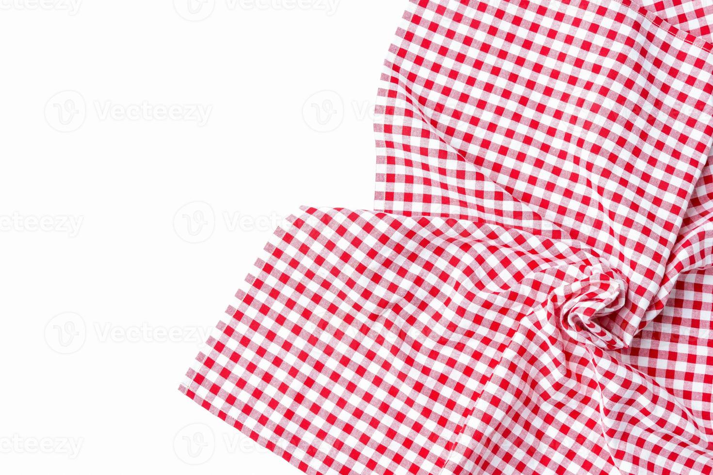 Top view napkin checkers red and white folded neatly place on a white background. Fabric red and white Isolated with copy space. photo