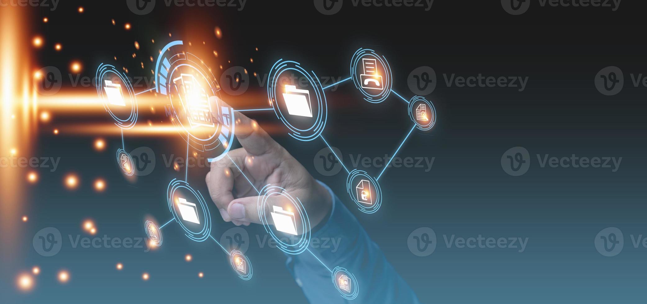 Document Management System. Businessman touching icon virtual online. Database and process automation to manage files, knowledge, and documentation in the company. photo