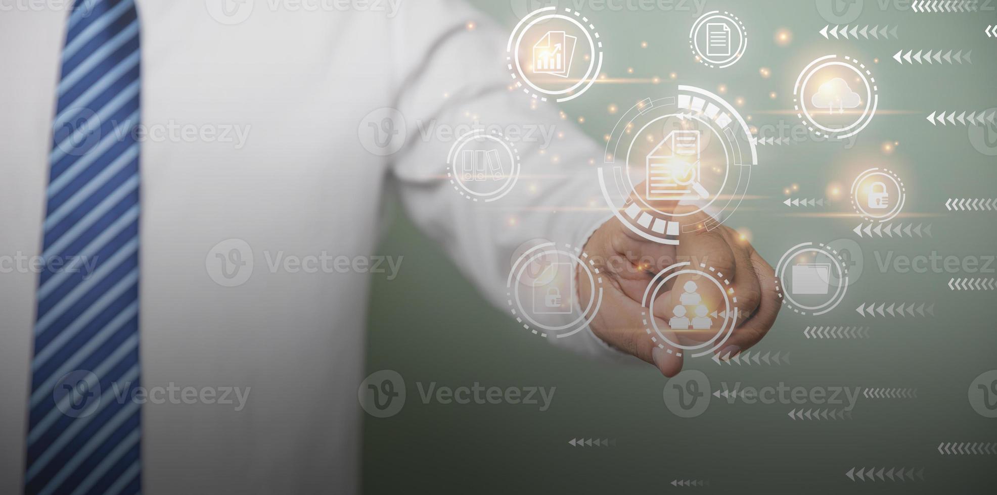 Virtual online database process automation to efficiently manage files. Business, Technology, Internet, and network. Businessman touching on document icon corporate data management system. photo