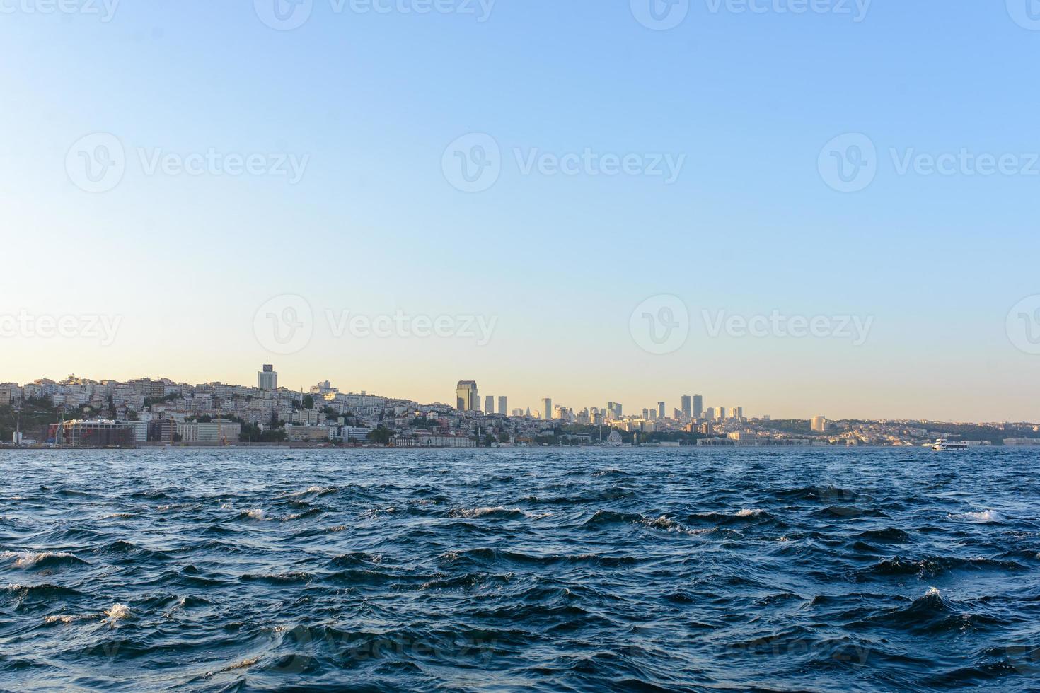 View of the left bank of Turkey through the Bosphorus. Turkey, Istanbul 08.23.2019 photo