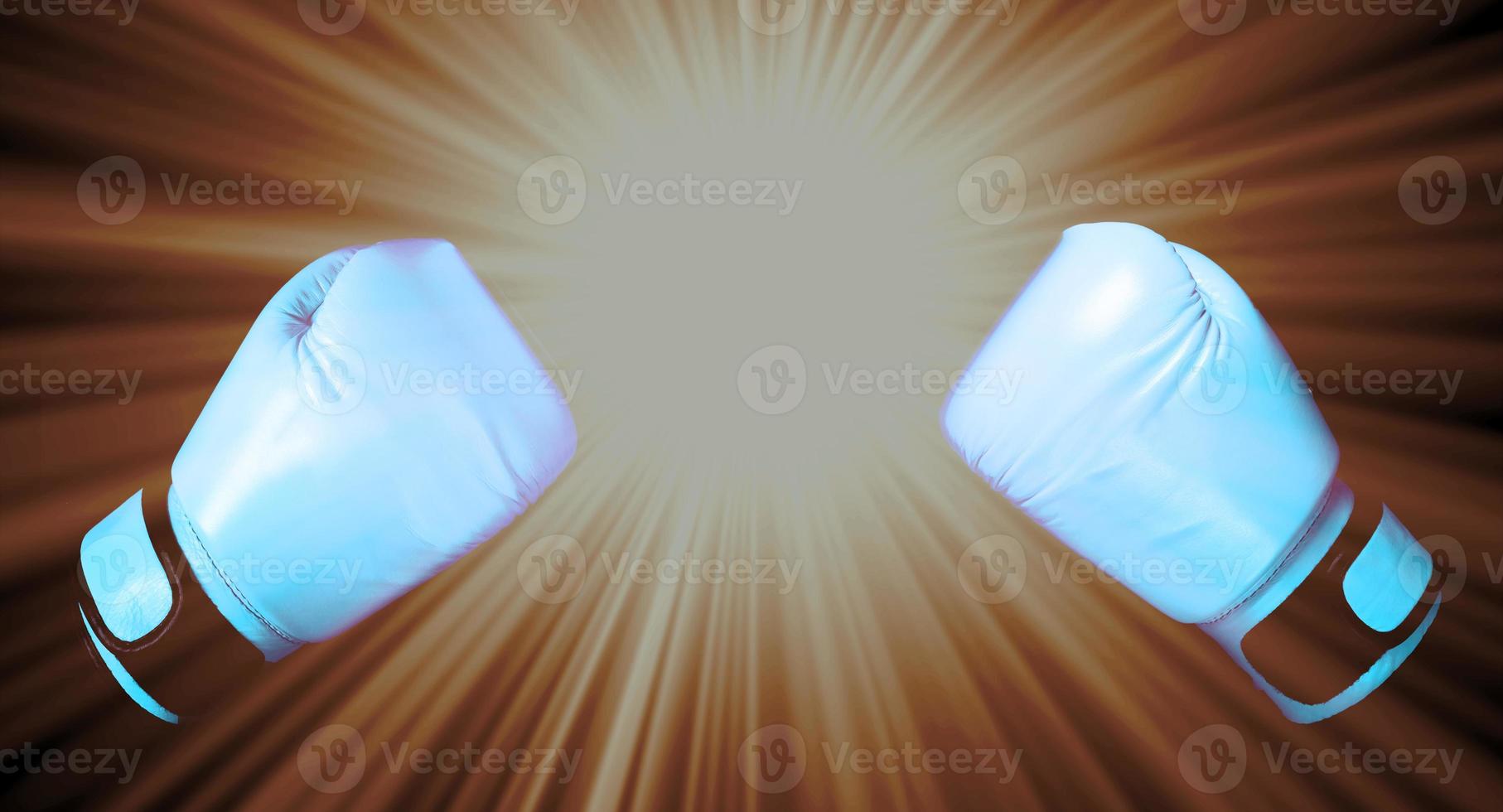 Blue Boxing glove in punching  in black background with copy space photo