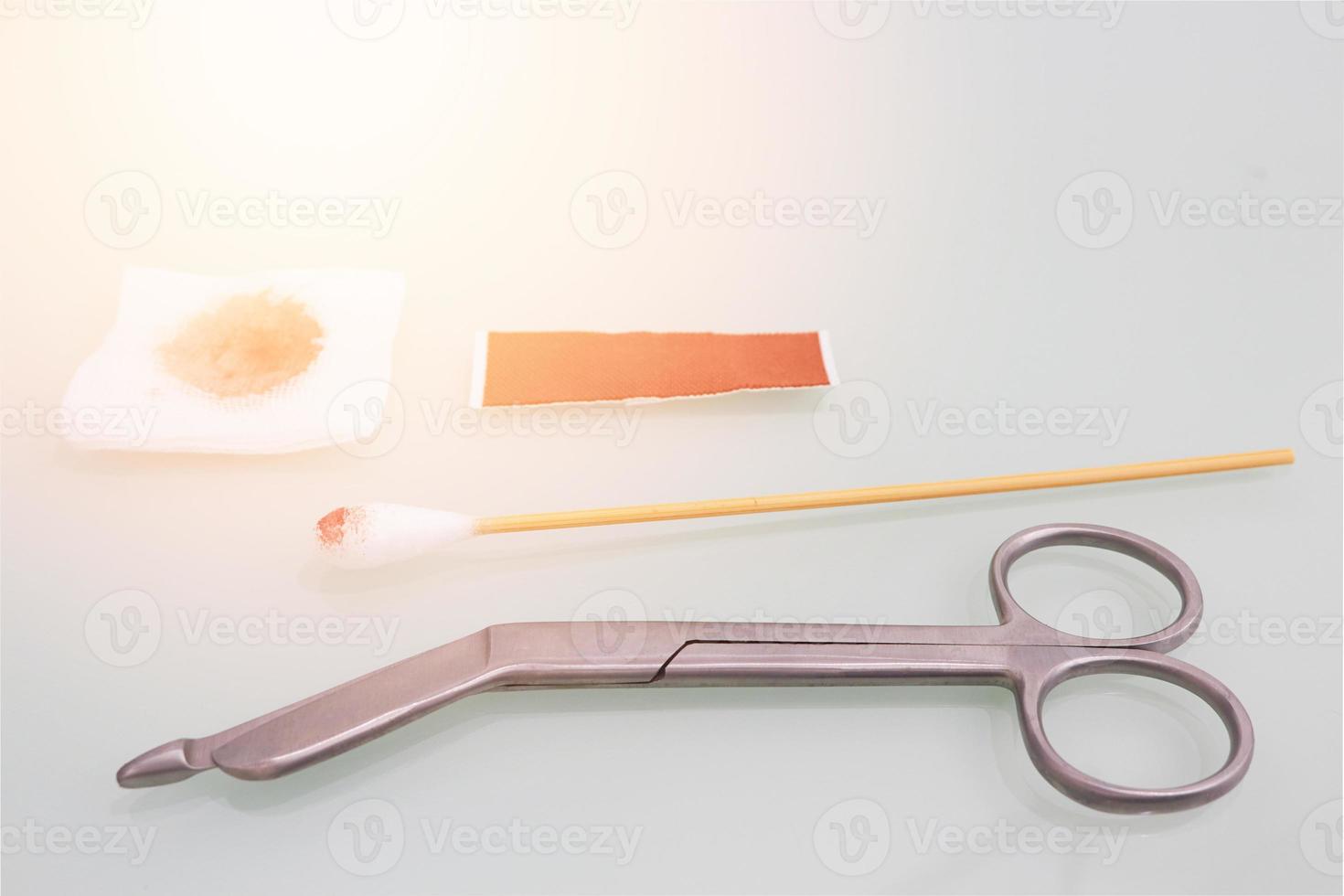 Guaze cutting scissors blood gauze ,swab and plaster on copy space photo