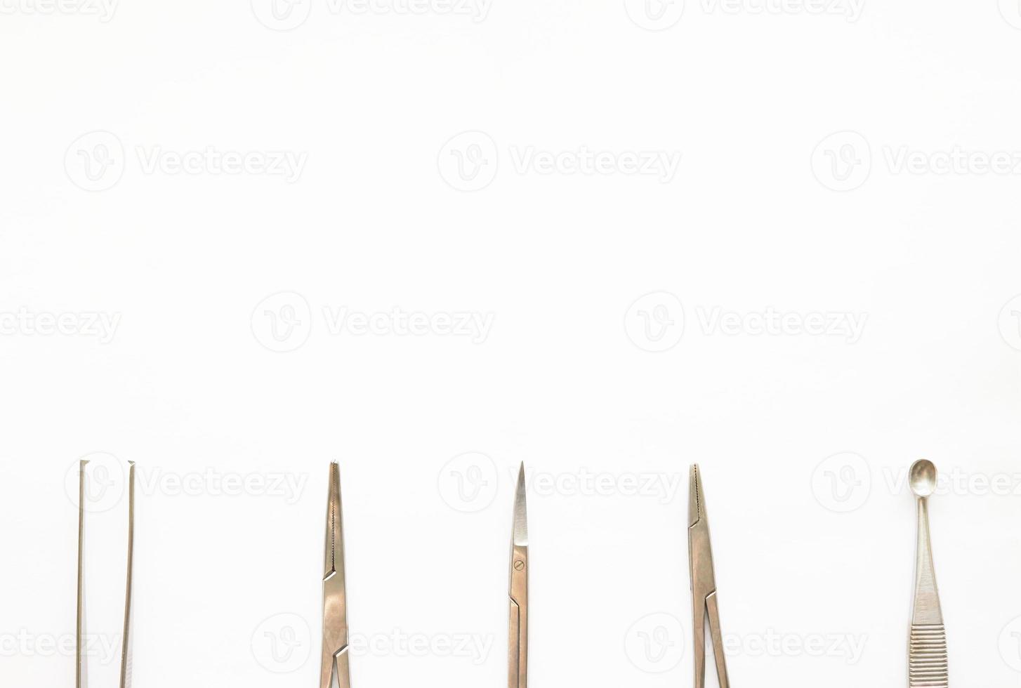 Doctor tools ,curettage ,cramps,forceps.scissors on white background with copy space photo