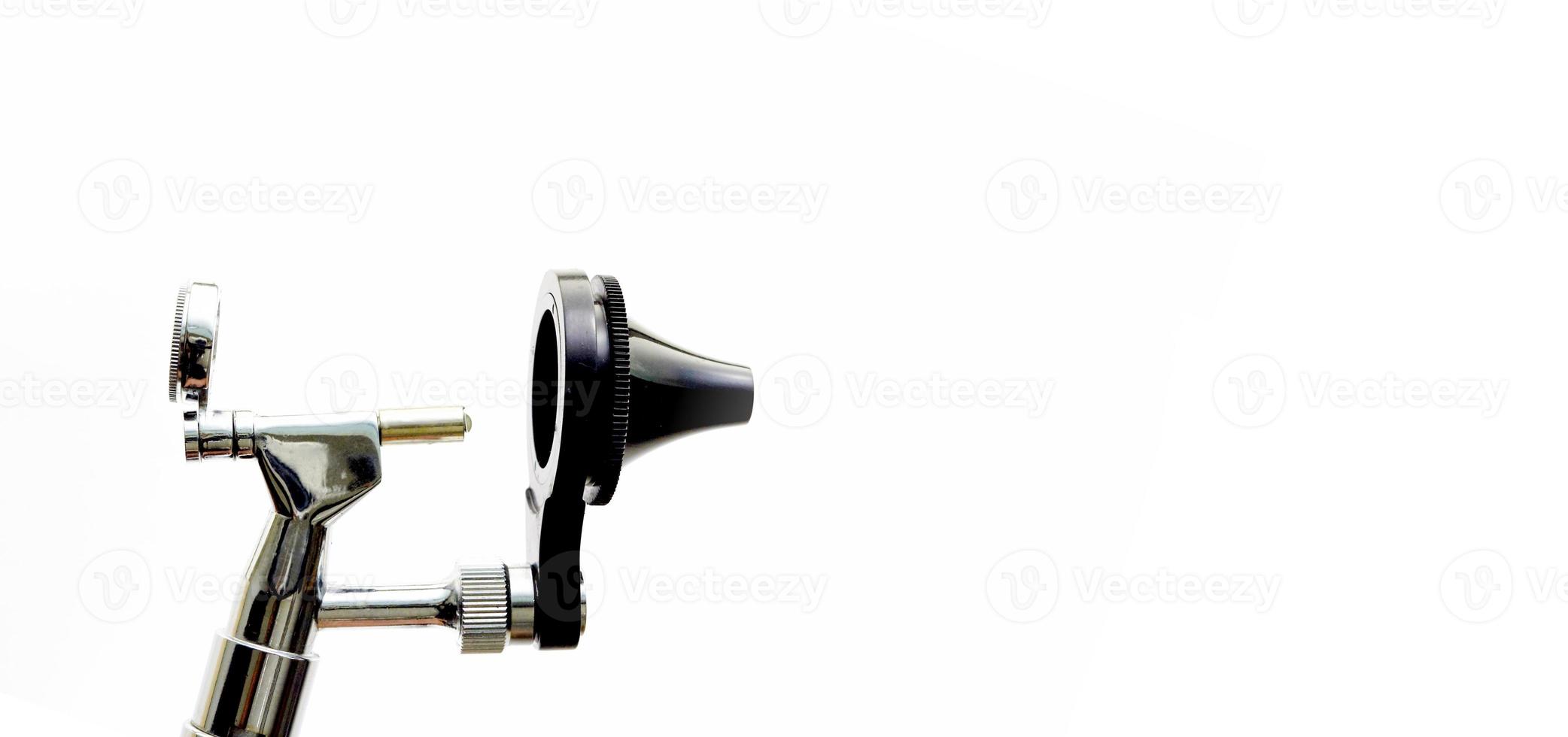 Otoscope for ENT doctor exam ear head cone piece view on white background photo
