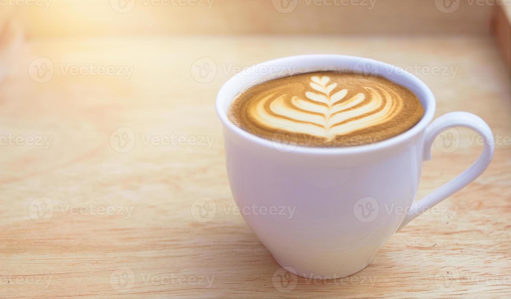 coffee cup in wooden background photo