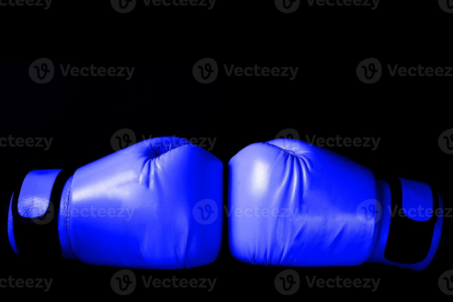 pink Boxing glove in punching in black background in woman concept