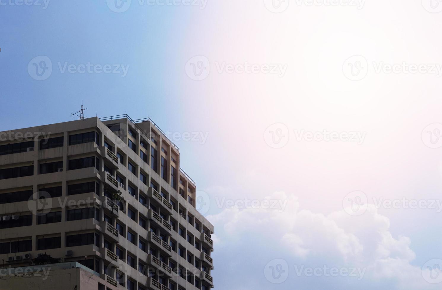 generic tower or apartment on blue sky background photo