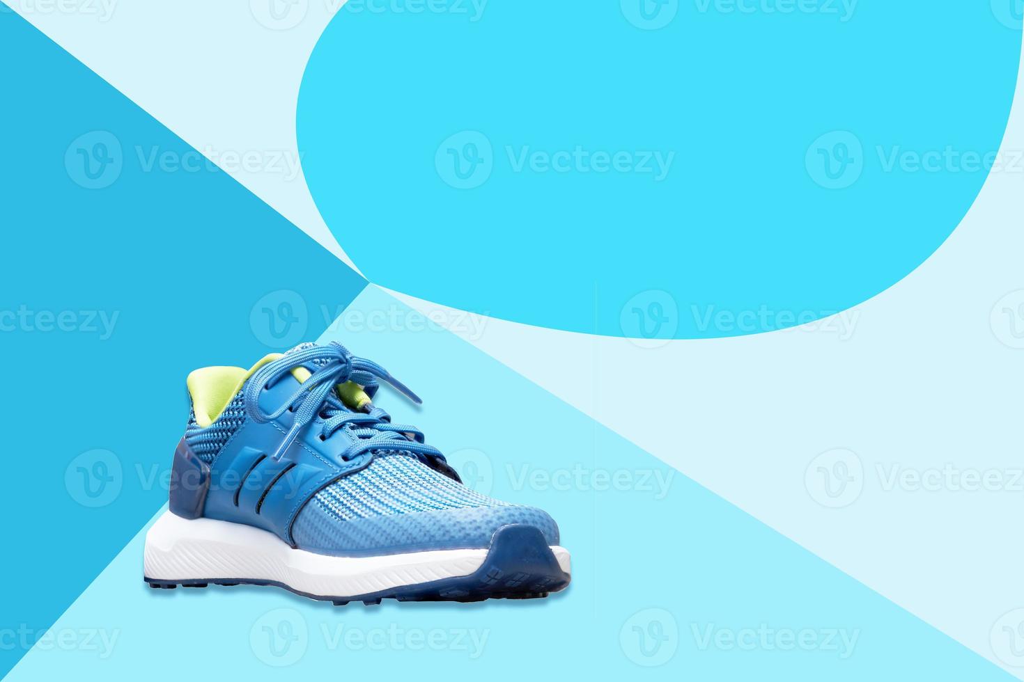 blue  sport shoes  on white isolated background photo