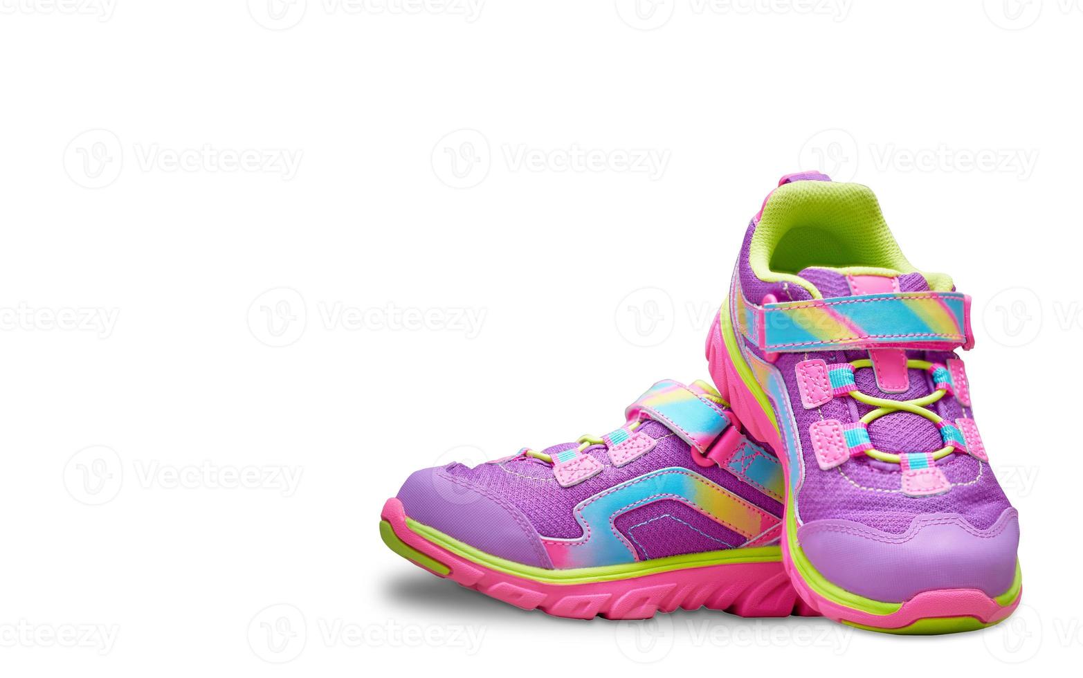 colorful kid shoes on white isolated background photo