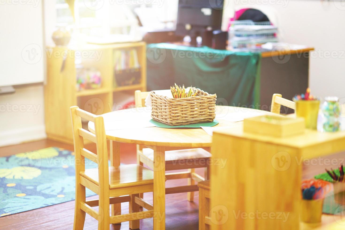 kindergarten education class room insde view include chairs and table photo