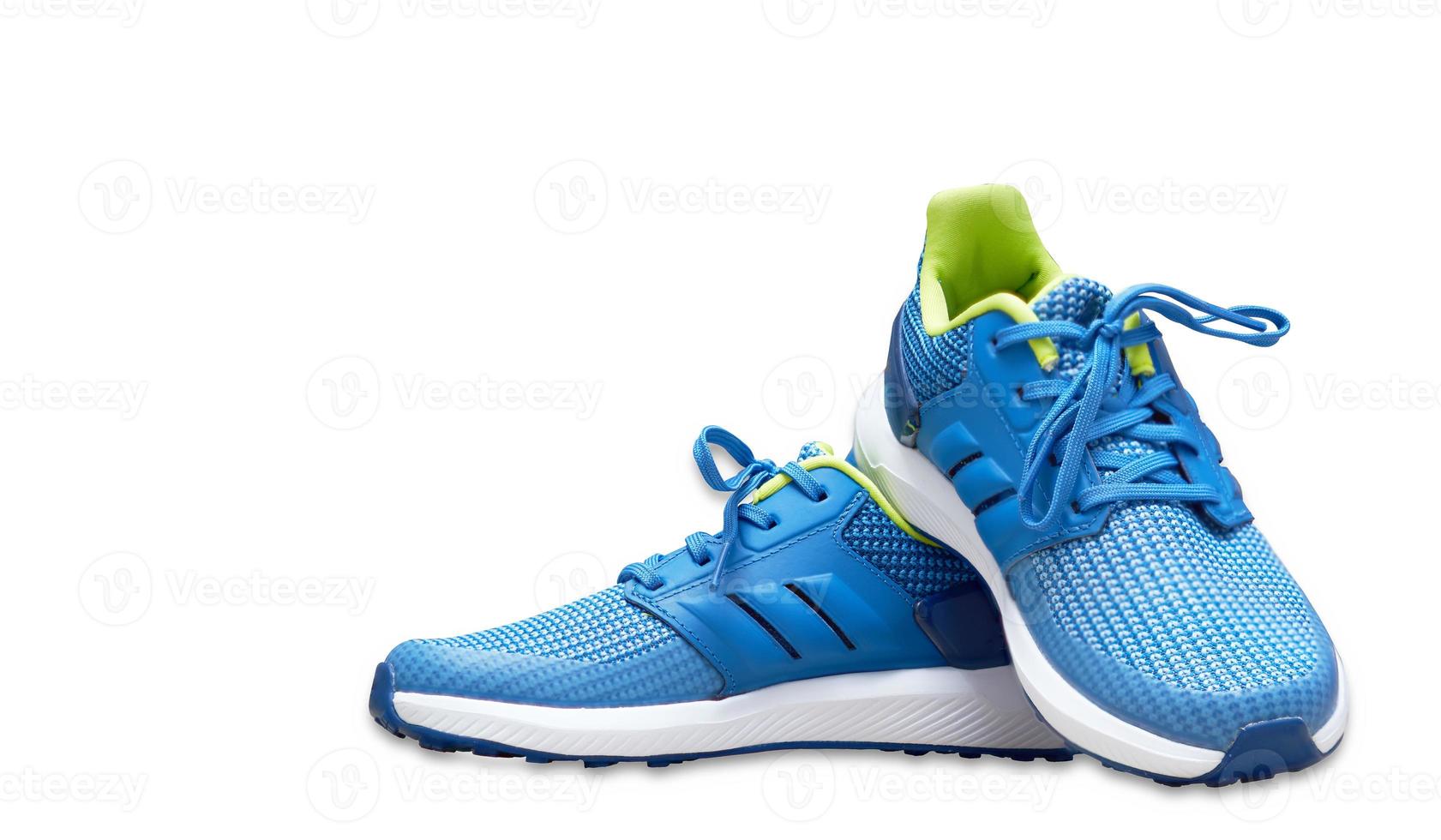 blue sport shoes  on white isolated background photo